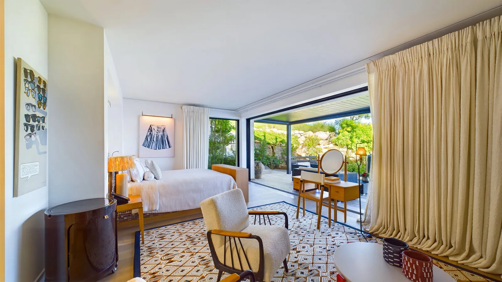 One of the five bedrooms at Villa Amitie, opening to the outside