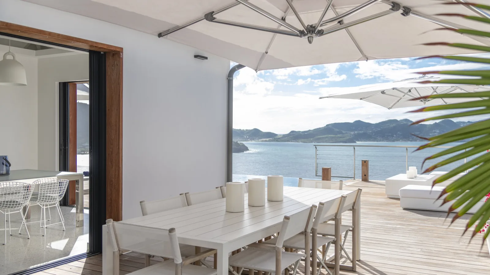Kitchen and dining area at Villa CAP AZUR, a 5-bedroom villa in Pointe Milou, St Barth