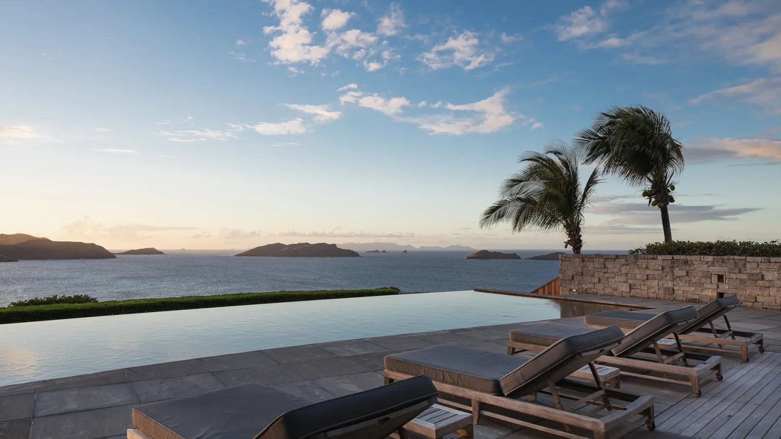 Sunset over the villa at Villa DANSE DES ÉTOILES, a 5-bedroom villa in Pointe Milou, St Barth