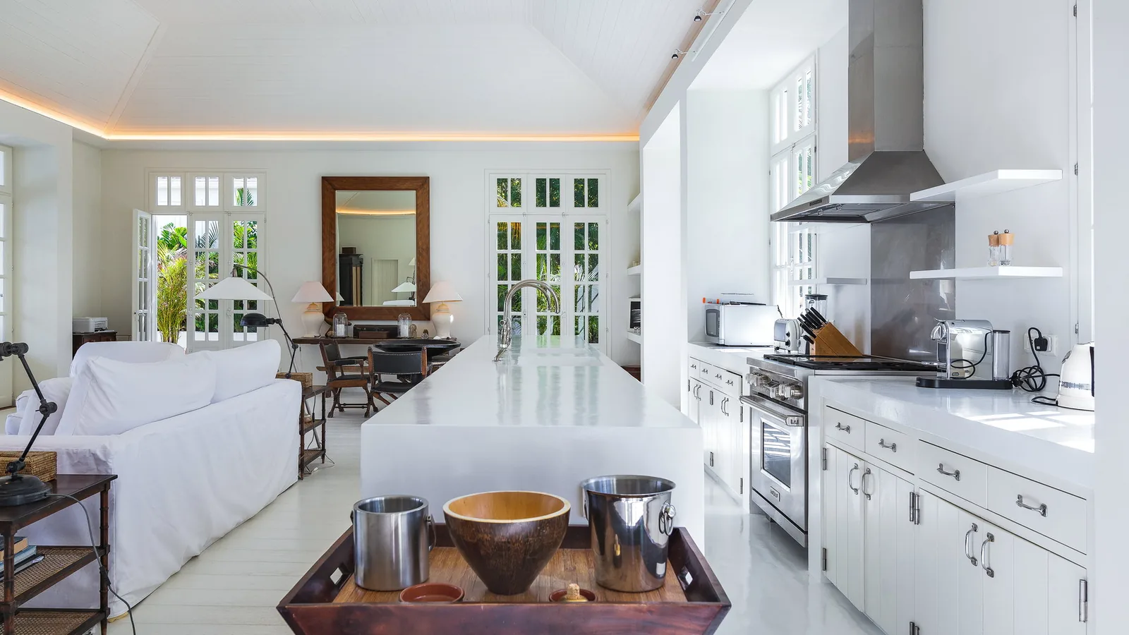 Poolside at Villa ELA, an eight-bedroom rental in Flamands