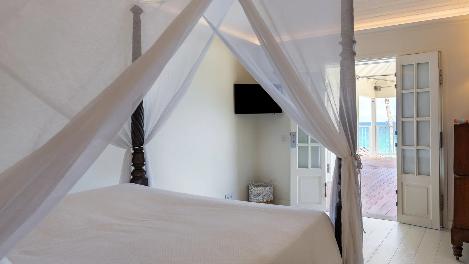 Another bedroom at Villa ELA, which sleeps sixteen guests