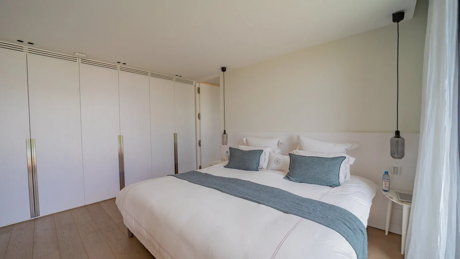 Travel cot provided at JUNE for families with babies