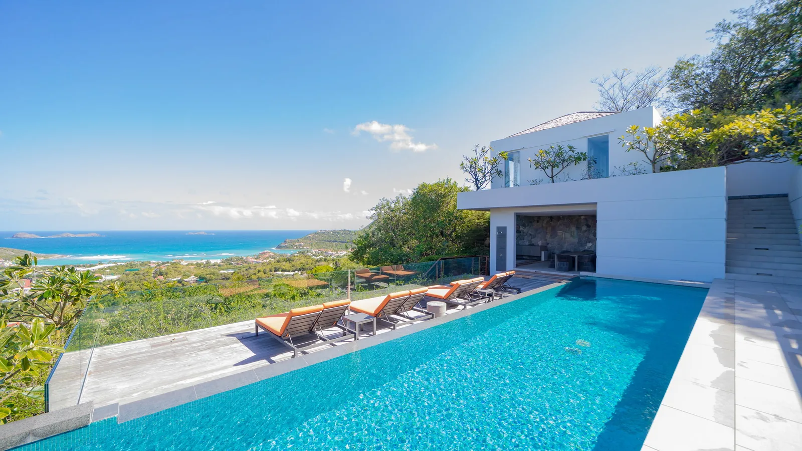 Poolside terrace at Panoramic, a five-bedroom villa in Lurin
