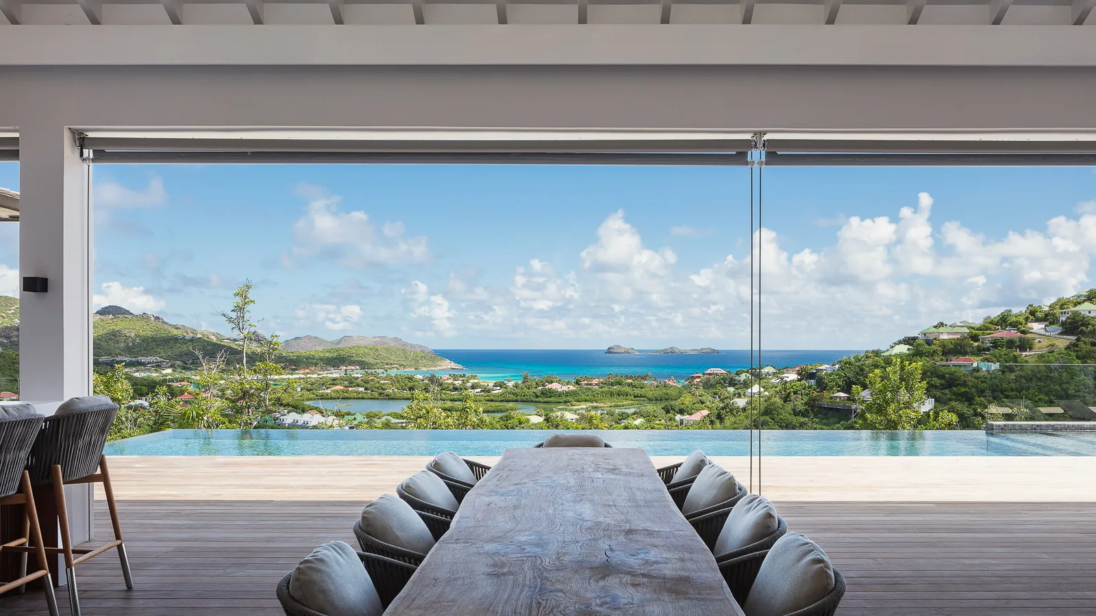 Air-conditioned bedroom at SEALA, a villa sleeping ten guests