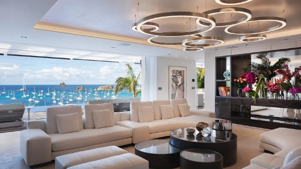 Hillside villa overlooking Gustavia harbor with floor-to-ceiling glass