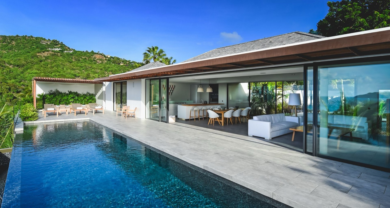 Hillside villa in Gouverneur with a private pool, open-plan living, and ocean views